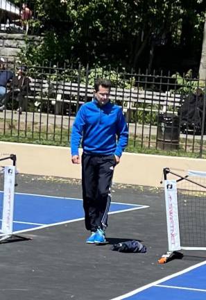 Albert the Pickler Doc, examines the freshly painted courts at Carl Schurz Park. He’s emerged as a controversial figure who is idolized by “picklers” for bringing the newfangled sport to the UES. Photo: Jack Ahern