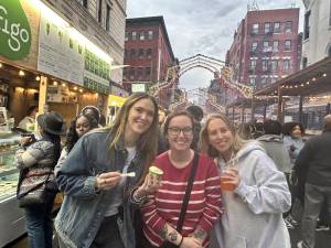 Attendees enjoy Figo gelato at the Feast of San Gennaro on Sept. 25 before the weekend rain.