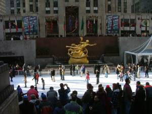Ice skaters revel at the Rockefeller Rink. It will reopen to the public on Oct. 11.