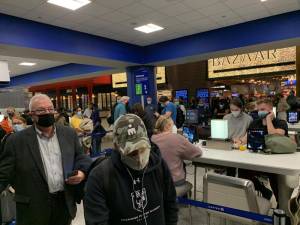 At Newark Airport Terminal C, mask-wearers were about 99%; while US Federal Law mandates masking in all transportation facilities, some individuals weren’t wearing them. There were no reprimands. Photo: Ralph Spielman