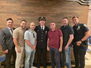 17th Precinct Commanding Officer Deputy Inspector Allan Kirmms (in hat) and some of his officers. The 17th Pct. continues to be a precinct with one of the lowest crime rates in Manhattan.