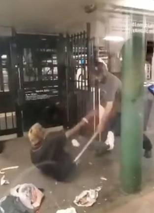 A bystander video depicting Norton Blake beating Laurell Reynolds with a cane at the W. 116 St. &amp; Lenox Ave. subway station.
