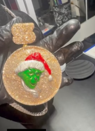 A “grinch” chain being shown off by one of the “grinch boys” on social media. On Feb. 6, the Manhattan D.A.’s office indicted four people for allegedly operating a club robbery ring that targeted high-credit customers.