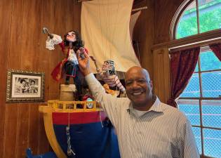 Master Puppeteer Bruce Cannon in Central Park’s Swedish Cottage Marionette Theatre, where he has worked since 1975, rising through the ranks from apprentice to artistic director.