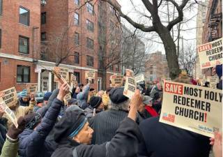 About 100 parishioners were joined by preservation groups at a rally outside Most Holy Redeemer Church on Dec. 8.