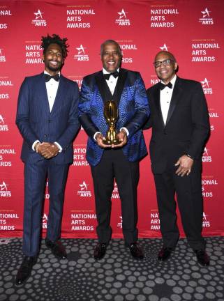 Jon Batiste, Robert Smith, and Nolen Bivens. Photo: Deonté Lee, Courtesy of BFA.com
