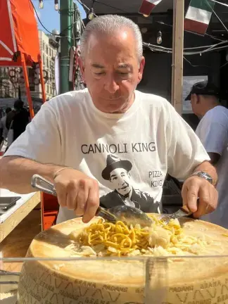 John DeLutro is hard at work during the 2024 San Gennaro Festival.