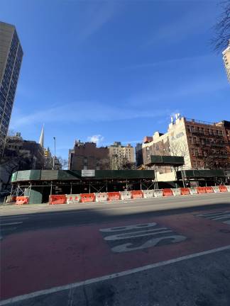 The plot on Third Ave., where multiple low-rise buildings used to stand, as seen from across the street.