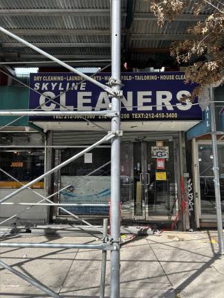 Outside the front of Skyline Dry Cleaners on Feb. 27. The shops on the ground floors were forced to close after the fire and have no target date for reopening.