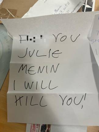 A photo of a threatening letter that Julie Menin received on October 5.