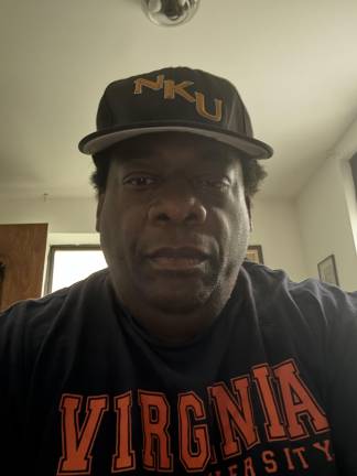 Baseball Coach Youman Wilder kept an eye on his baseball players when ICE agents came calling at Riverside Park recently.