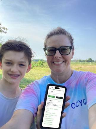 Heather and Luca Spinelli with the FarmScout app.