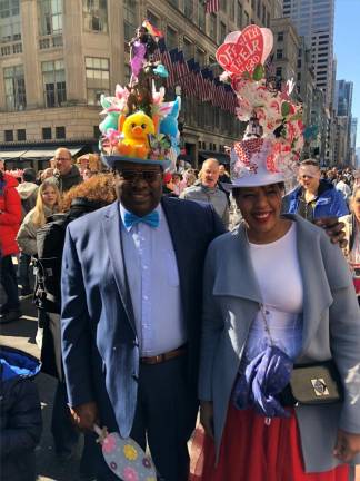 Andrew S. (left) from Far Rockaway and Lizzie Jerez from northern Manhattan show off their headwear outside St. Patrick’s Cathedral at the annual Easter Parade. Photo: Keith J. Kelly