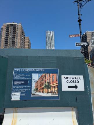 The controversial and now stalled development at 250 Water St., next to the Peck Slip School.