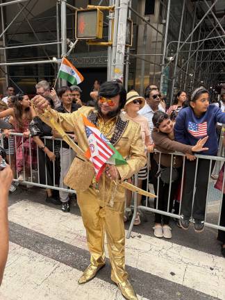 India Day Parade thrills many thousands along Madison Avenue, including a man in gold lame.