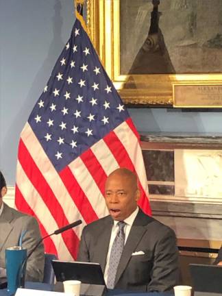 <b>Eric Adams at his year end press conference at City Hall on Dec. 26, said he disagrees with Gale Brewer’s propolsed bill that would allow vendors to remain on the Brooklyn Bridge.</b> Photo: Keith J. Kelly