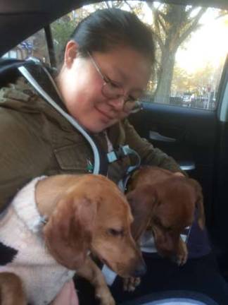 Helena Yoo with Duck and his sister Robin right after Duck was found in the Bronx.