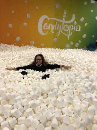 The author in Candytopia’s marshmallow pit. Photo courtesy of Bethany Kandel
