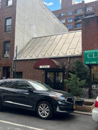 206 E. 31st St., where 52 year-old Nadia Vitel was reportedly murdered on March 13. The authorities continue to investigate the incident, and have taken no suspects into custody.