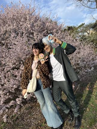 Alex Boodram and Chelsea Soo Hon from Queens came out to enjoy the Cherry Blossoms in Central Park