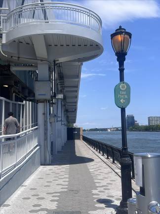A small portion of a long-shuttered stretch of the East River Esplanade in the East 70s has been reopened, representing slight progress in an endless hospital construction saga.