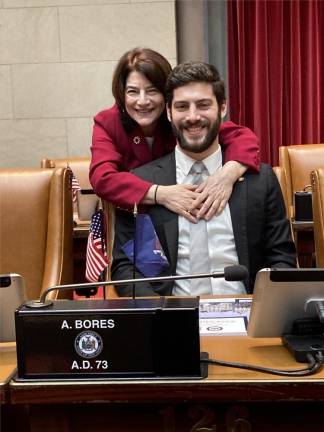 Proud mom Lori Bores gives her son Alex a hug after he won election as the assemblyman for the 73rd district, representing the Upper East Side. Photo: Courtesy Lori Bores