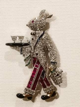 A jaunty rabbit serving cocktails was both a statement of fun and a political commentary, since it was made and worn during the Prohibition Era.