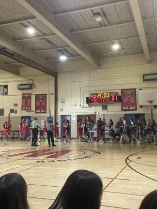 Wagner and Booker line up to shake hands following Booker’s narrow victory to send them to the NYC MSAL Championship. (Photo: Seneca Farhy)