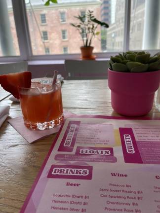 <b>There is a full blown menu with food, sweet deserts and kids and adult beverages at the Malibu Barbie Cafe that started its four month run in mid-May at the South Street Seaport.</b> Photo: Yelp