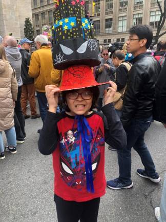 <b>Alfonso Macchia Barba, 10, designed his own costume for the Easter Parade, with a little help from his aunt, Rosina Baraba.</b> Photo: Keith J. Kelly