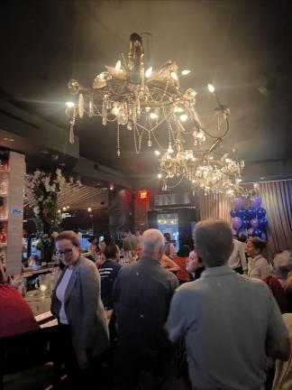 Supporters congregated before Hoylman-Sigal arrived, sharing drinks and stories at the Dakota Bar on West 72nd Street.