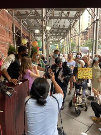 A resident of the Lucerne speaks to elected officials and reporters at a press conference organized by Upper West Side Open Hearts on Sept. 9. Photo: Alexis Gelber