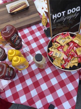 The condiment station for the hot dogs.