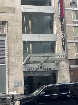 The building houses a hotel known as The Herald, which is battling eviction proceedings after reportedly owing $1.6 million in unpaid rent.