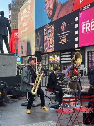 Subway performers Lucky Chops--with a special appearance by mayor Eric Adams--kicked off a promotional event to launch the new logo. but not everyone is so excited about it. Photo: Kay Bontempo