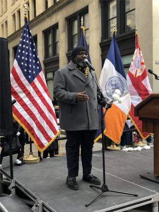 <b>Singer named Jamal, who is also a member of the UFT, belts out Amazing Grace at Triangle Shirtwaist Factory fire commemoration.</b> Photo: Keith J. Kelly