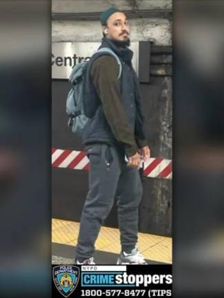 Amidst rising threats of hate against religious and other institutions, the NYPD said it searching for a man accused of punching a woman on a 7 train platform in Grand Central Terminal on Oct. 14 because “you are Jewish.” He remains at large. Photo: NYPD Crimestoppers