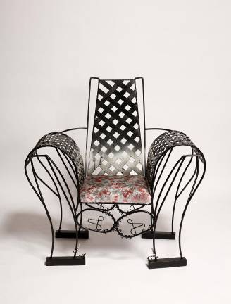 Richard Dial’s<i> Master’s Chair II, 2025,</i> is created with welded steel, wood, and fabric. 52 x 50 x 32 inches.
