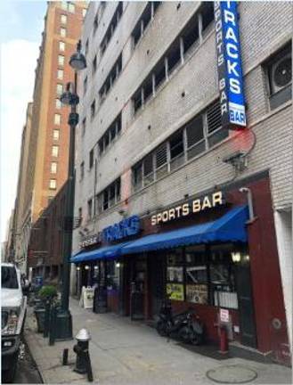 Tracks Sports Bar moved to West 31st Street when Penn Station was being renovated a decade ago. It has plans to return to the LIRR concourse while continuing to run an aboveground bar, but those plans could be forced to change if Amtrak pushes for a Penn Station overhaul that would tear down the neighborhood block.
