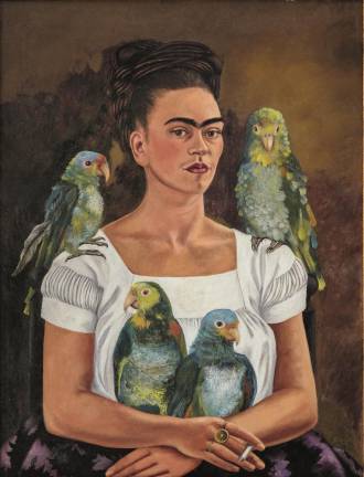 From The Whitney’s “Vida Americana: Mexican Muralists Remake American Art, 1925–1945”: Frida Kahlo, “Me and My Parrots,” 1941. Oil on canvas, 32 5/16 × 24 3/4 in. (82 × 62.8 cm). Private collection. © 2020 Banco de México Diego Rivera Frida Kahlo Museums Trust, Mexico, D.F. / Artists Rights Society (ARS), New York