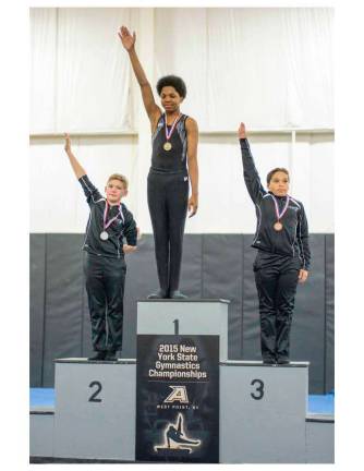 An Asphalt Green boys gymnastics team at the New York state championships earlier this year.