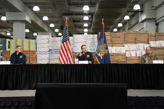 Gov. Andrew Cuomo during a coronavirus briefing at the Javits Center on Tuesday, March 24, 2020. Behind him are boxes of medical supplies.