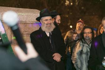 Rabbi Ben Krasnianski at Chanukah in the Park 2019.