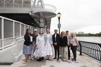 City Council Speaker Julie Menin (pictured center, blue) and NYC Parks Commissioner Tricia Shimamura (pictured far-left) are hailing the partial reopening of the East River Esplanade which will now allow access up to East 73rd Street.