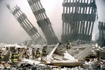 Photographer Peter Foley was able to capture firefighters digging on the rubble on the day the towers fell because one of the lieutenants from the West Side firehouse where Foley had lived for a year smuggled him on board a bus transporting firefighters to search for survivors at Ground Zero.