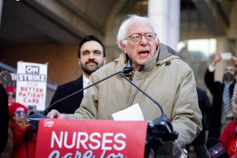 Senator Bernie Sanders (at mic) and Mayor Zohran Mamdani address nurses in bitter cold outside Mount Sinai West hospital on Tenth Ave. and 58th St. on Jan. 20 during the ninth day of the strike.