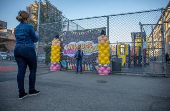 Families return to John F. Hylan PS 257 Magnet School of the Performing Arts on Sept. 5, 2024.