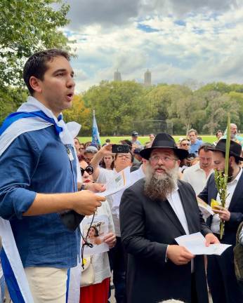Jewish vigil in Central Park October 7, 2025. Note orthodox men holding esrog and lulav.