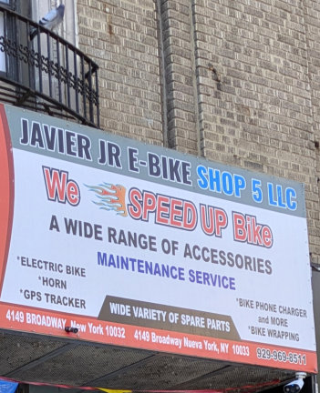 Awning sign at 4149 Broadway in northern Manhattan advertises: “We Speed Up Bike.”