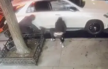 Hoodie-clad wheel thieves near the southeast corner of Third Avenue and East 89th, July 11, 2025.